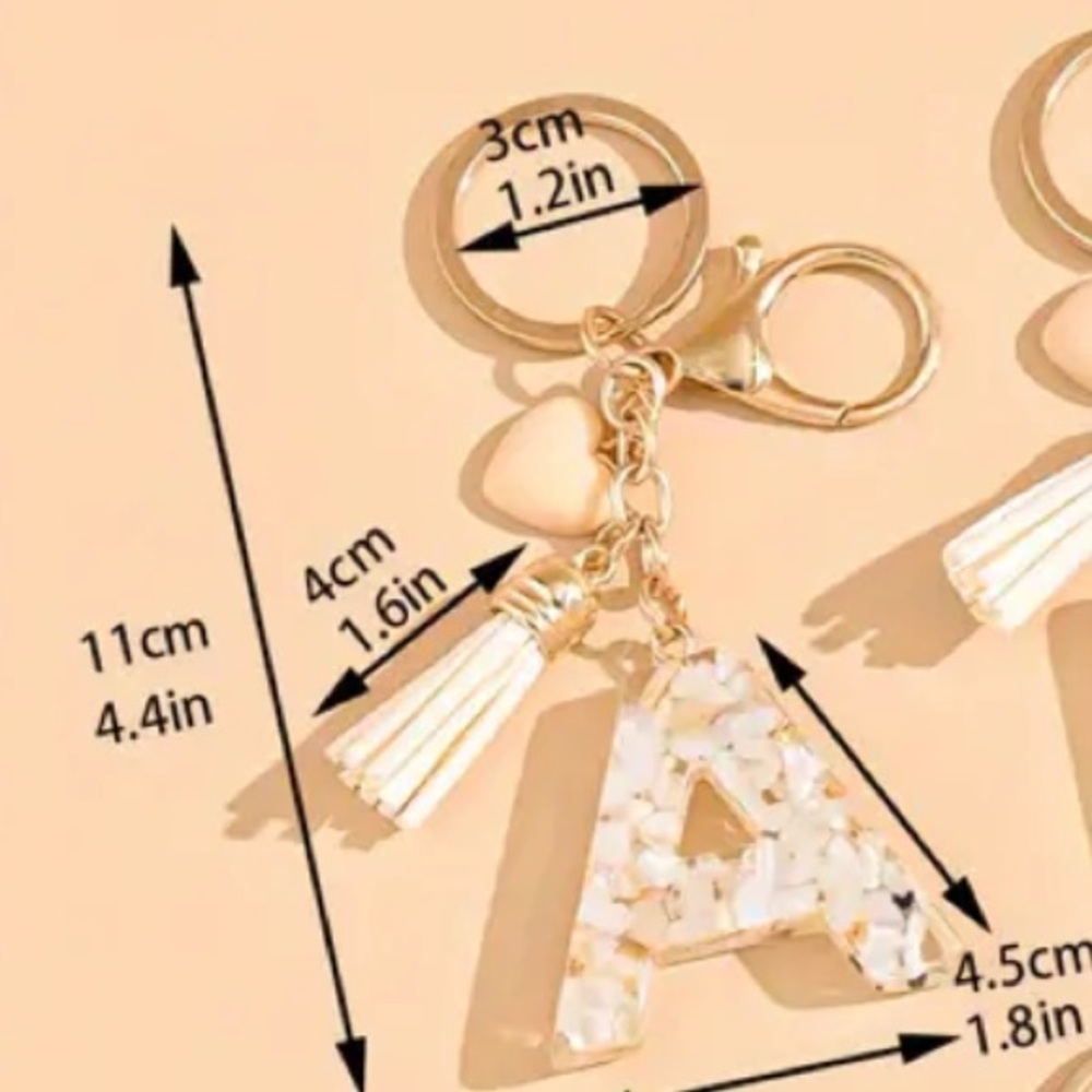 NEW Monogram letter A adorable resin gold keychain. 4x2”